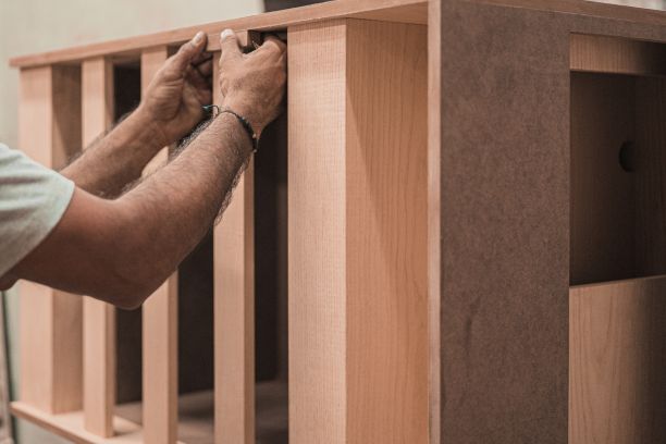 a carpenter building a wood structure